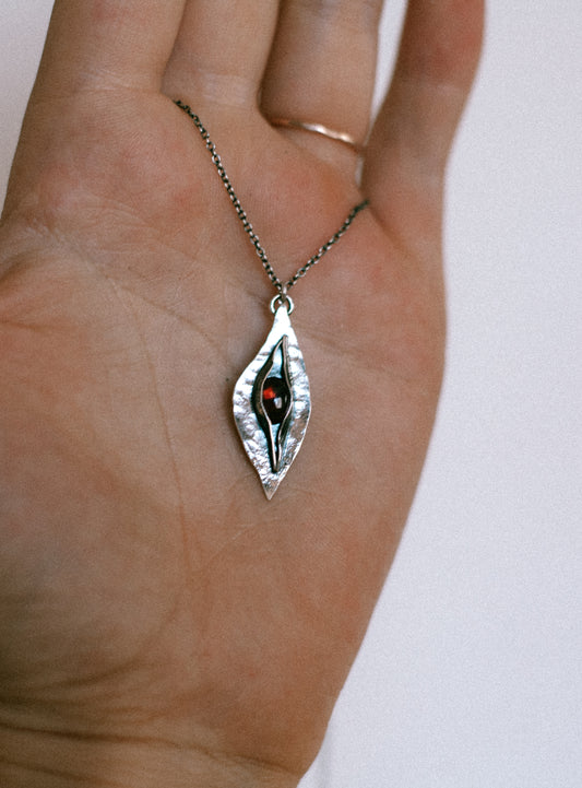 vulva pendants & blood adornments