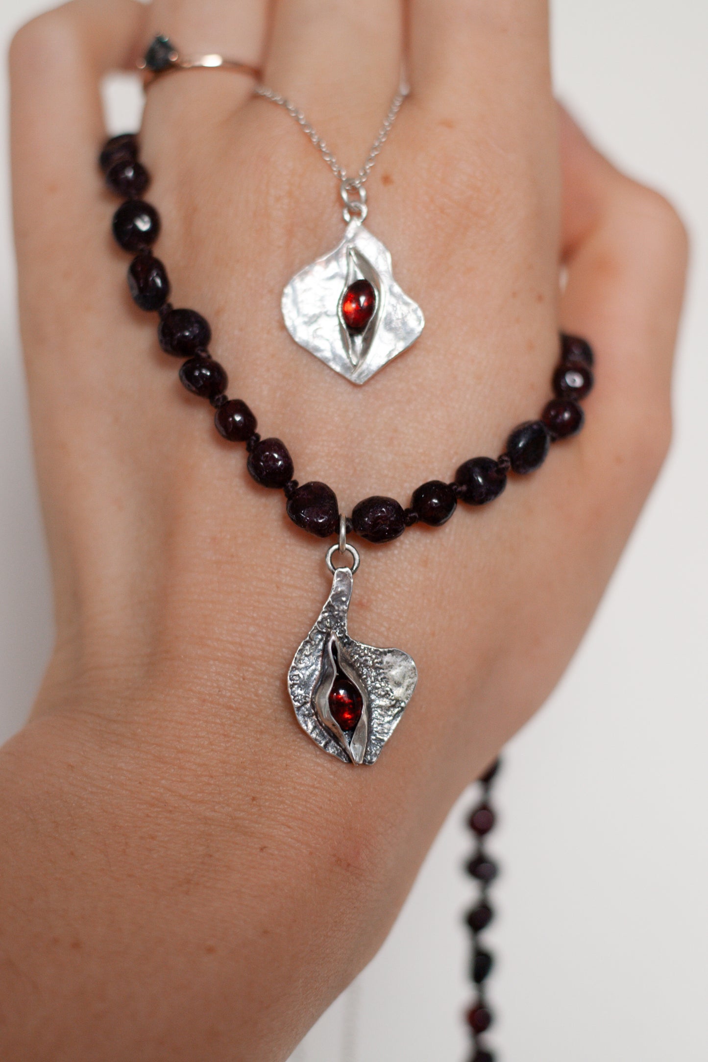 vulva pendants & blood adornments