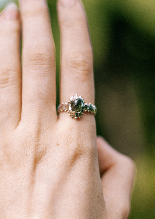 deep green raw sapphire ring