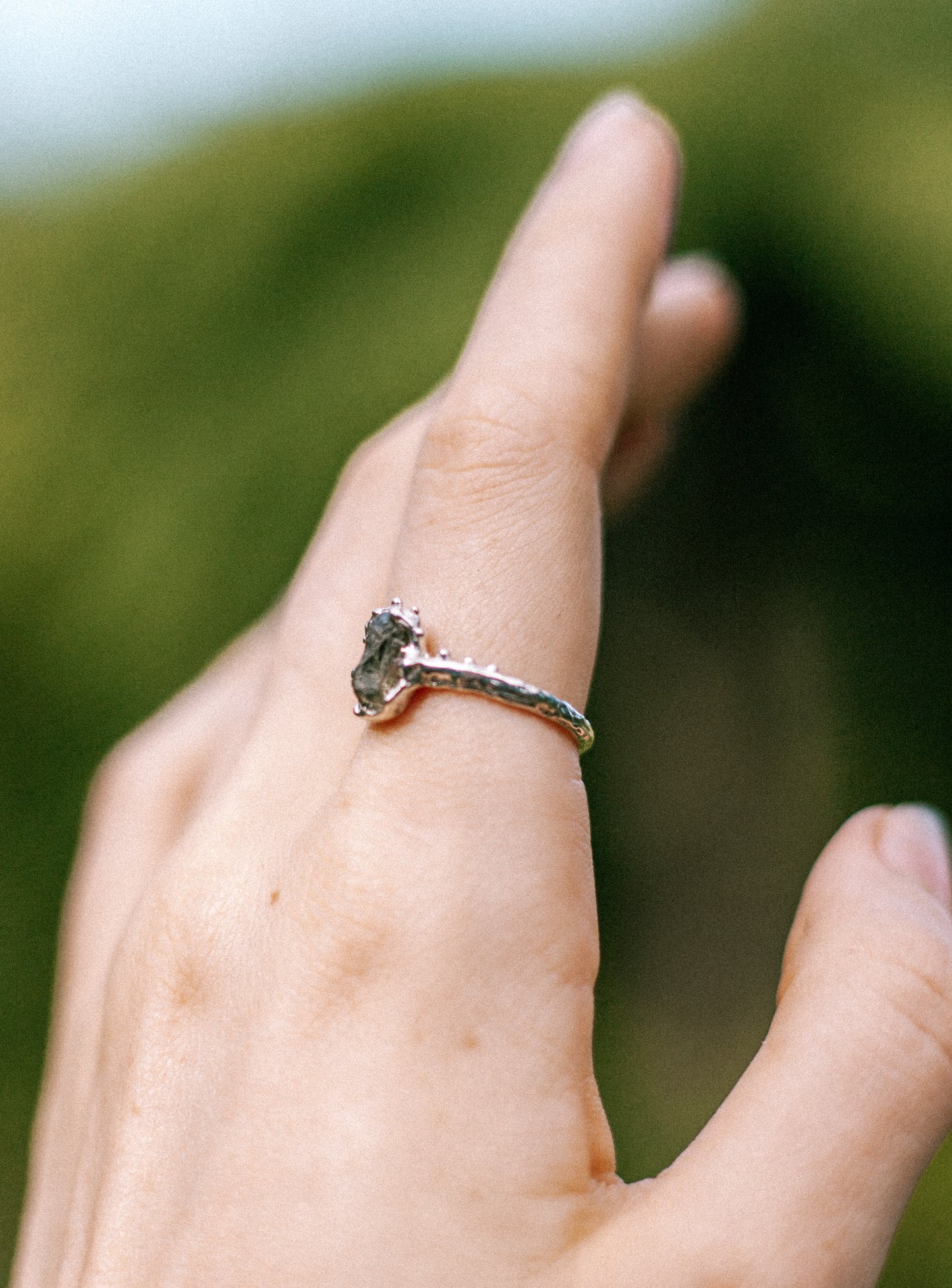green raw sapphire ring