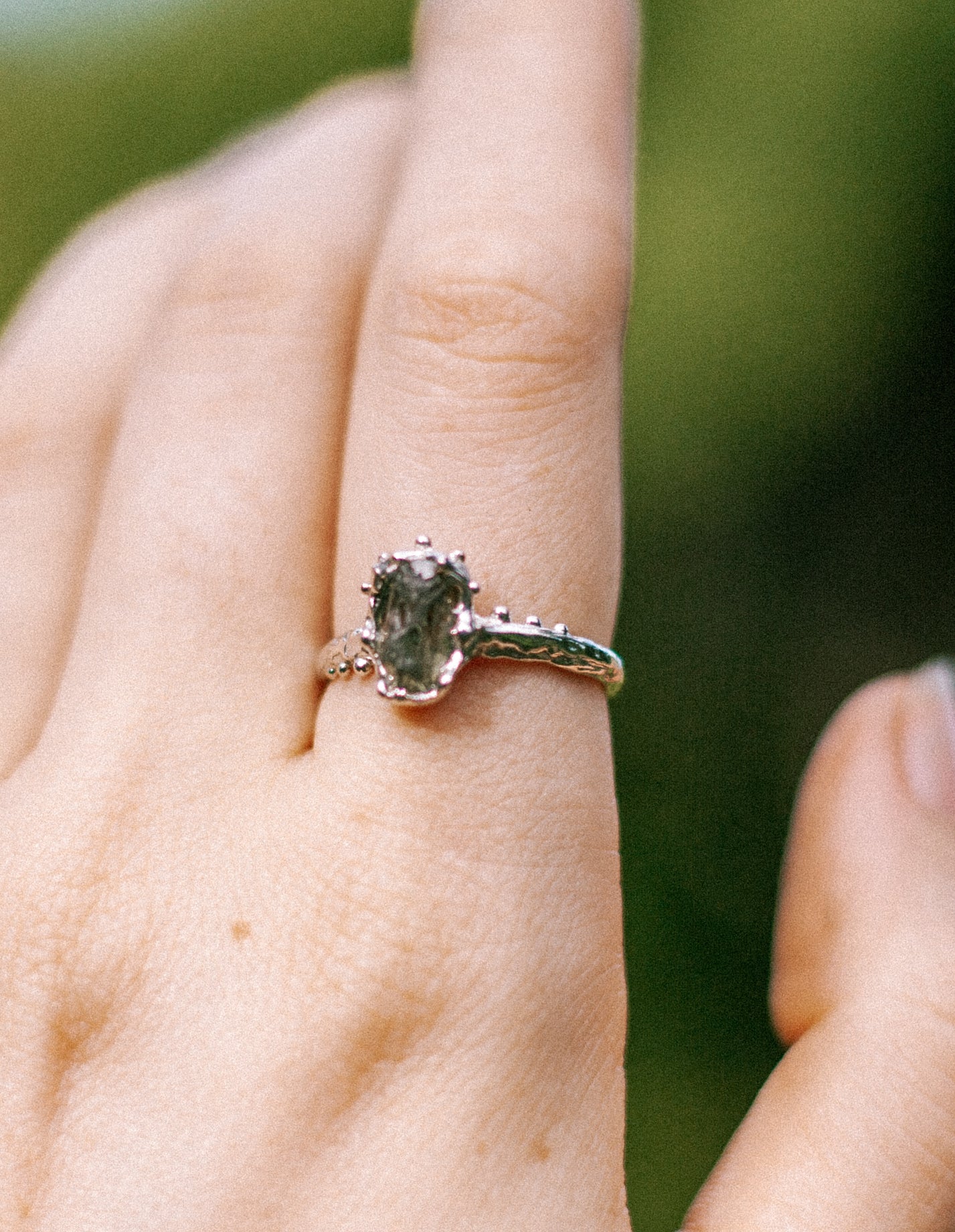 green raw sapphire ring
