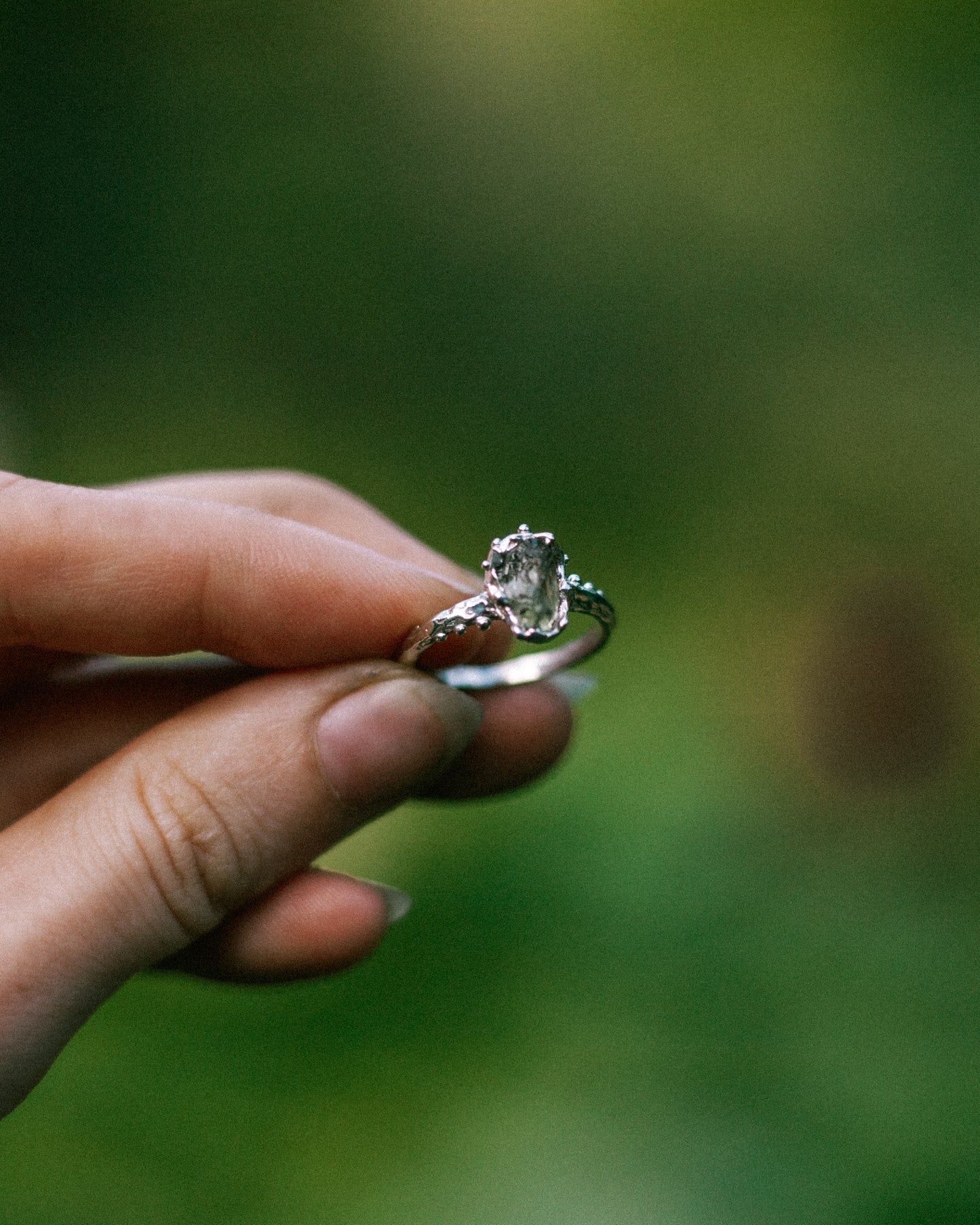 green raw sapphire ring