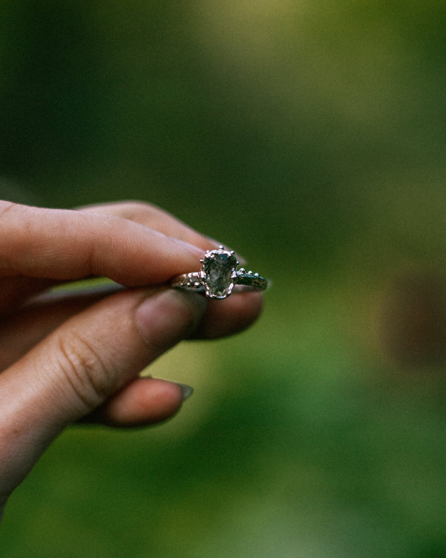 green raw sapphire ring
